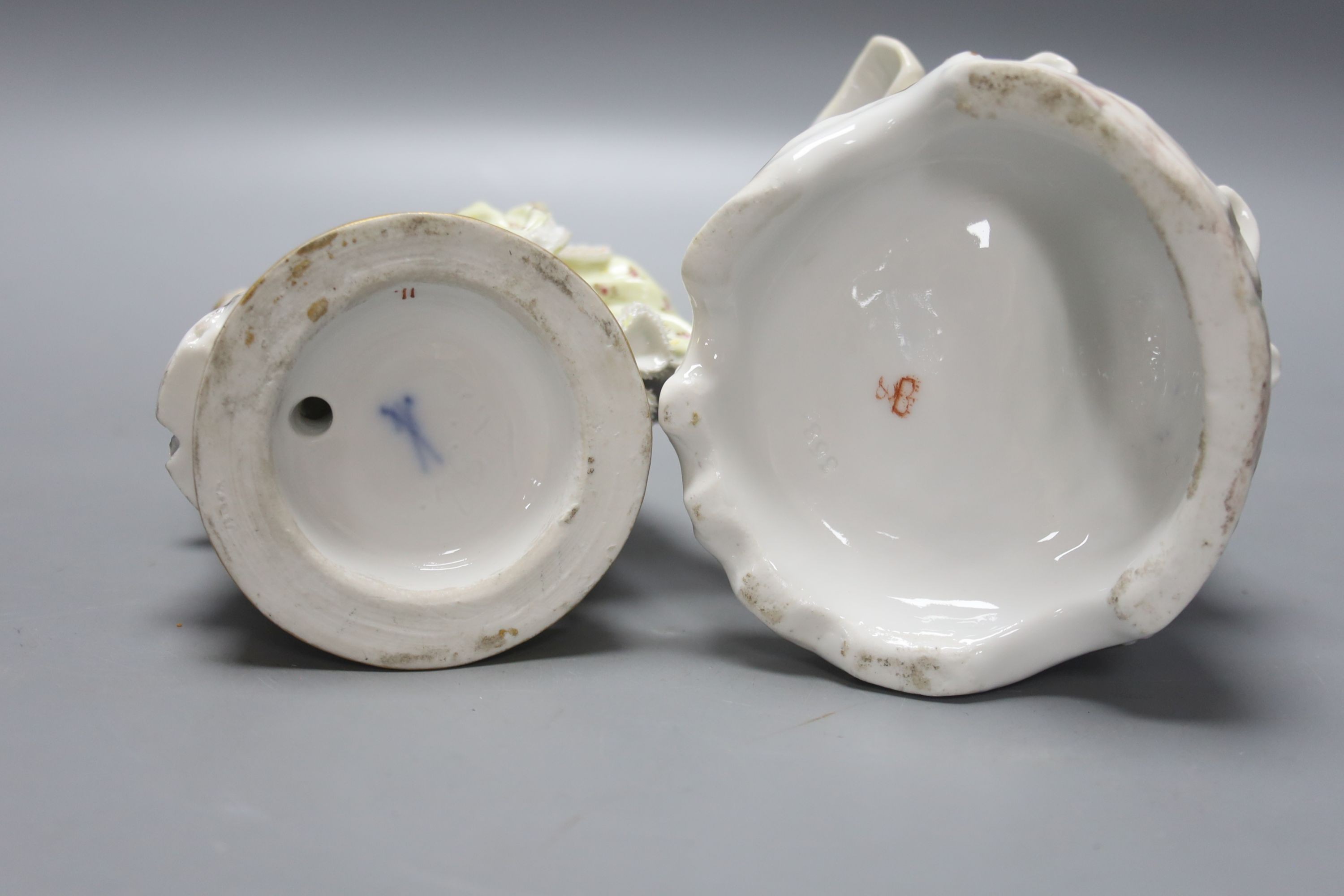A Meissen figurine, and a continental porcelain figure of a lady with pseudo Derby Mark, tallest 22.5cm